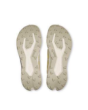 On trail sneaker with rocker midsole